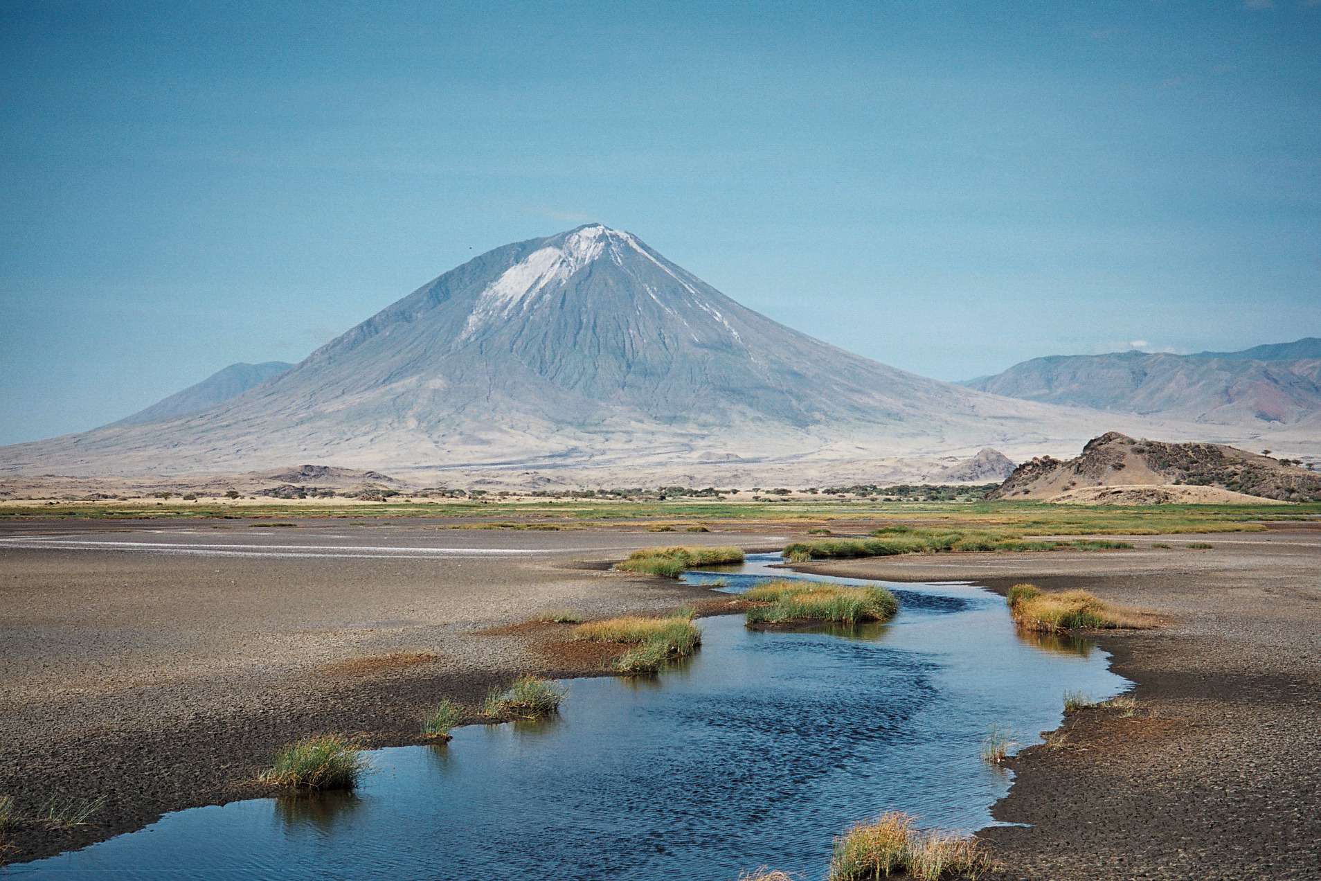 Scenic Lake Natron landscape with volcanic mountain in Tanzania