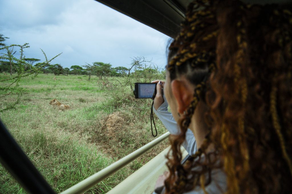 Safari game drive view from vehicle in Serengeti Tanzania