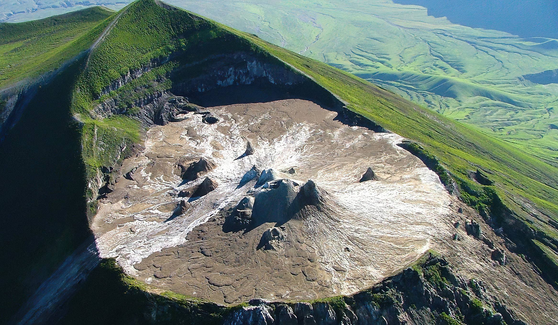 Hikers climbing Ol Doinyo Lengai during a night hike in Tanzan