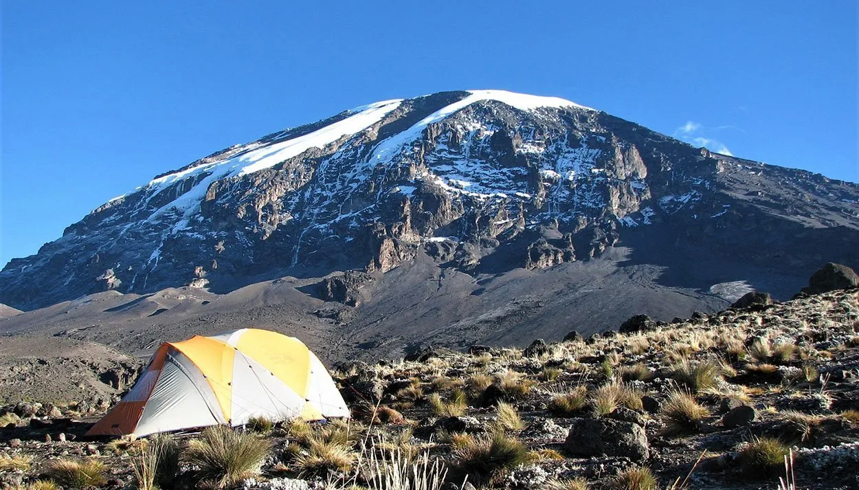 Trekkers hiking Mount Kilimanjaro