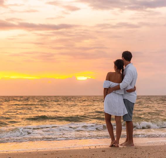 Couple enjoying a 12 Day Tanzania Honeymoon Safari during the Southern Serengeti Calving Season before relaxing in Zanzibar