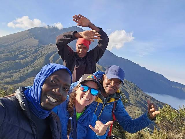 Mount Meru Cost guide showing trekkers climbing Mount Meru in Tanzania